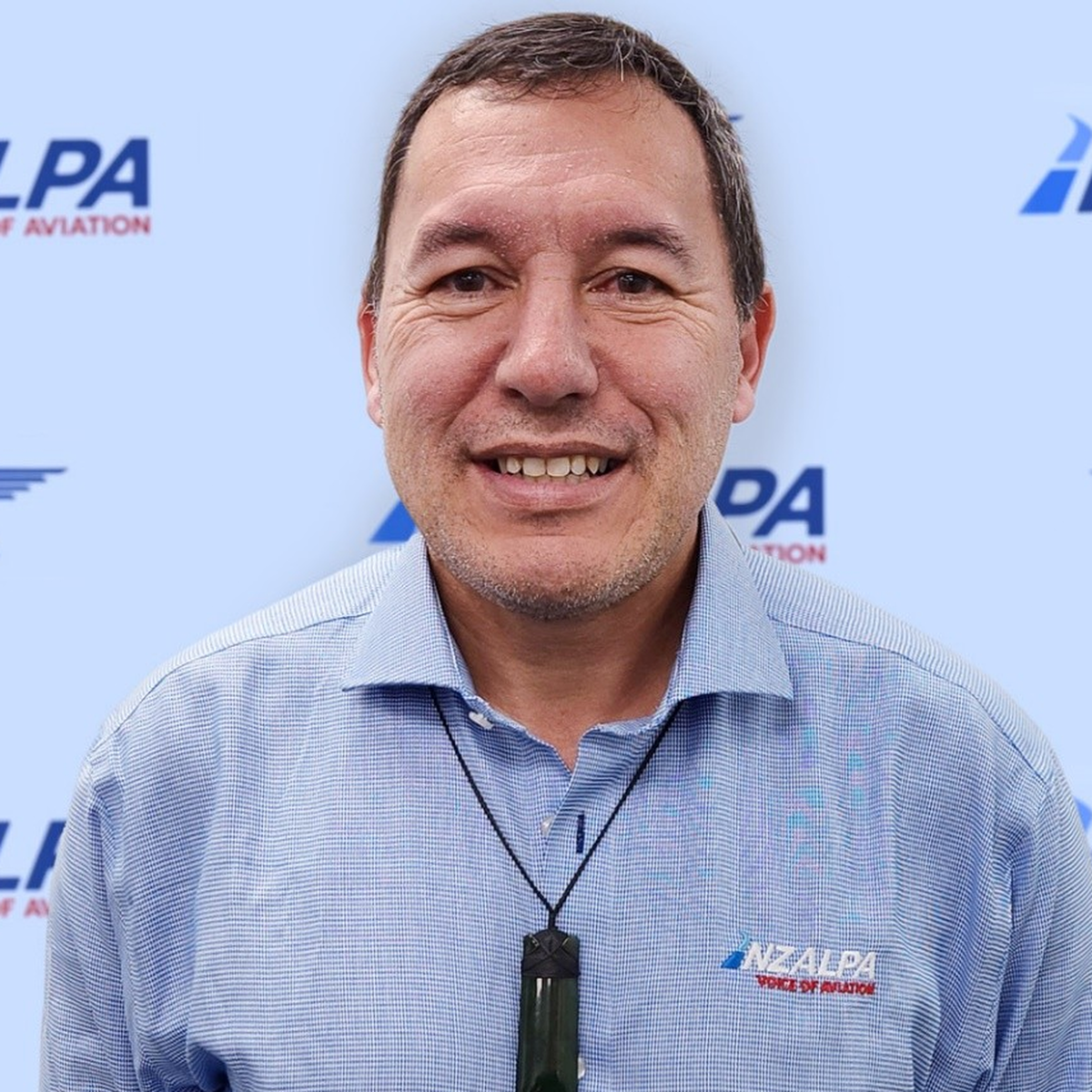 Portrait of Greg Okeroa